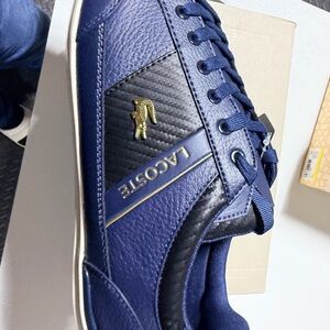 Lacoste Men's Navy and Black Low-Top Sneakers with Gold Accents